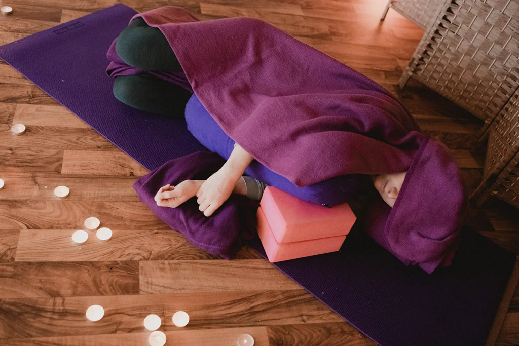 Wintering candlelit restorative yoga at Yoga Sangha